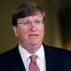 Mississippi Republican Gov. Tate Reeves delivers a televised address before signing a bill retiring the last state flag with the Confederate battle emblem during a ceremony at the Governor’s Mansion in Jackson, Mississippi, on June 30, 2020. Upon signing the bill, the flag loses its official status. - Lawmakers in Mississippi voted on June 28 to remove the Confederate battle standard from the state flag, after nationwide protests drew renewed attention to symbols of the United States’ racist past. The measure passed with a 91-23 majority vote in the House of Representatives, triggering cheers in the Senate gallery. A few hours later, the Senate voted 37-14 for the bill.